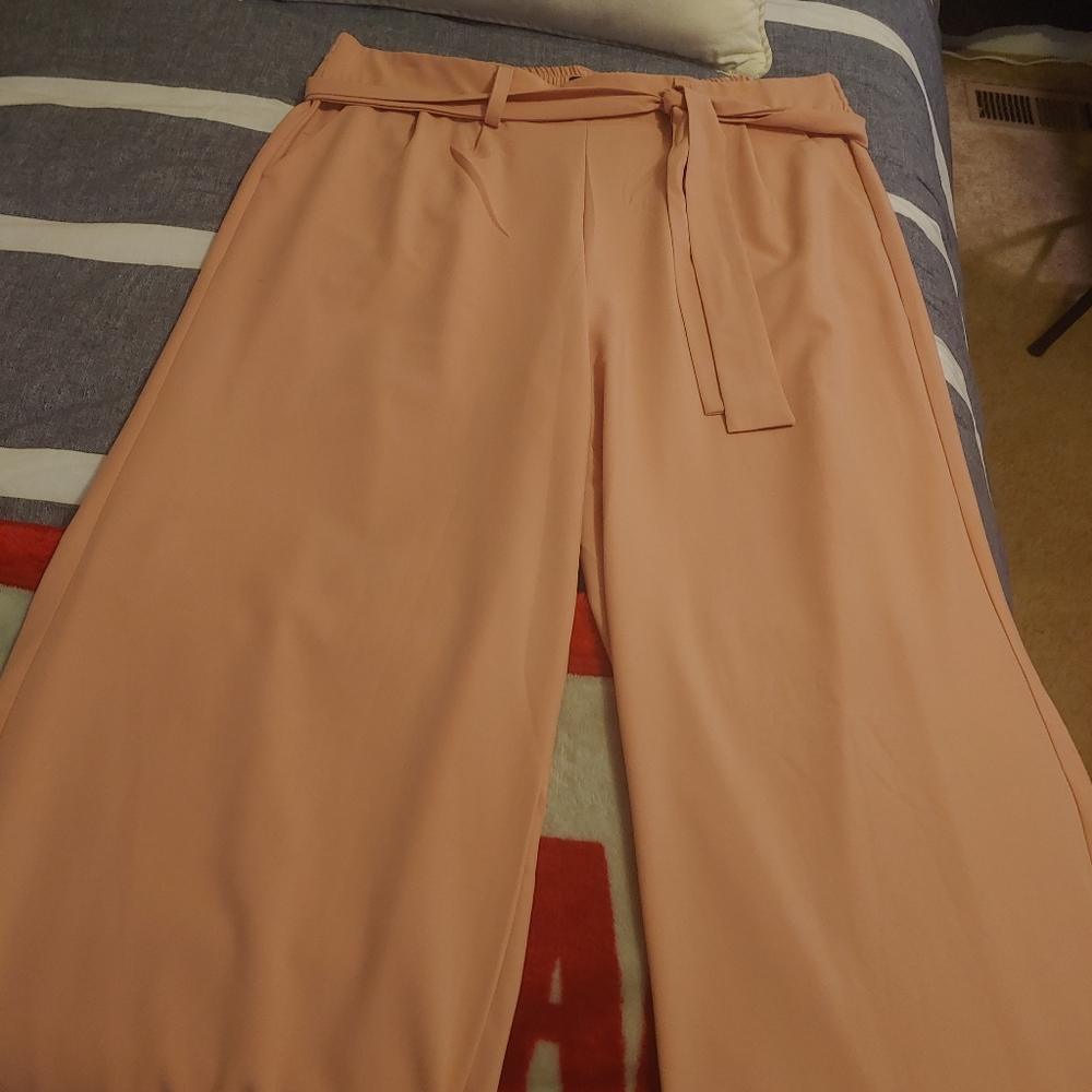 TORRID Soft pink dress trousers for every occasion.